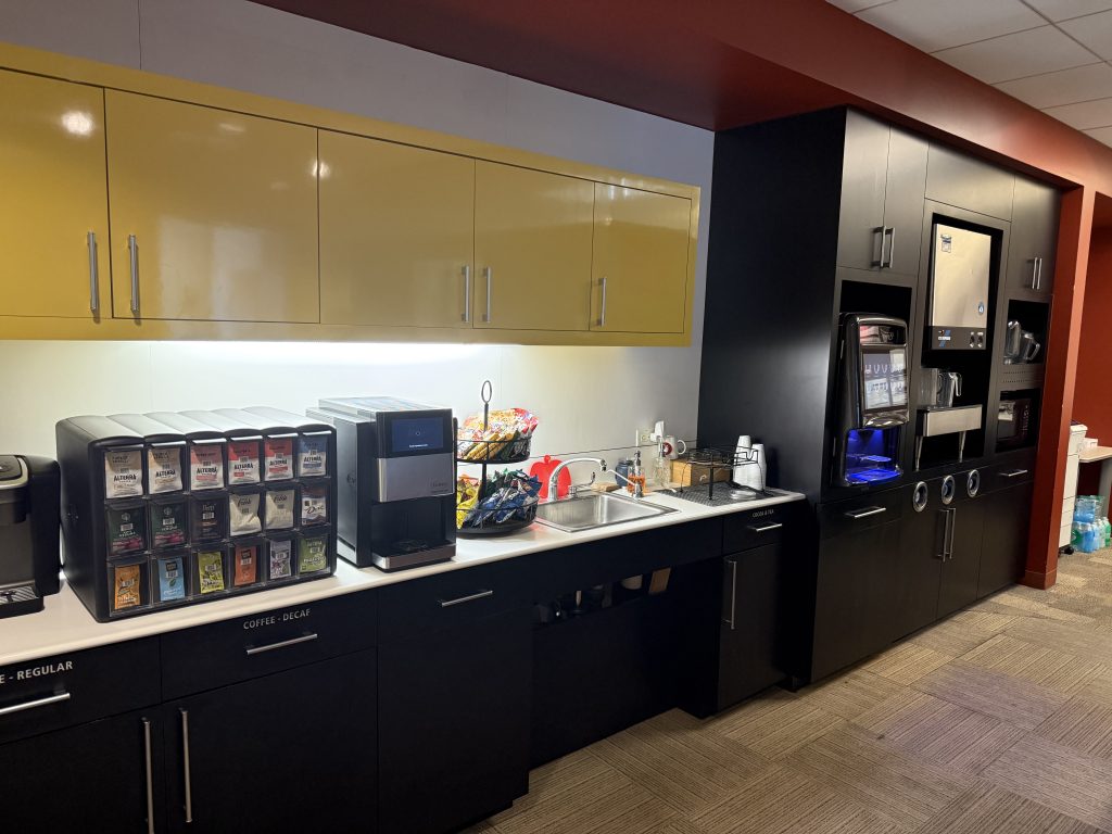 Computerized coffee/tea/hot chocolate machines with an assortment of snacks